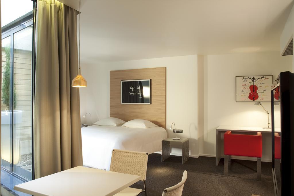 Hotel Le Pavillon 7 Obernai Ruang foto